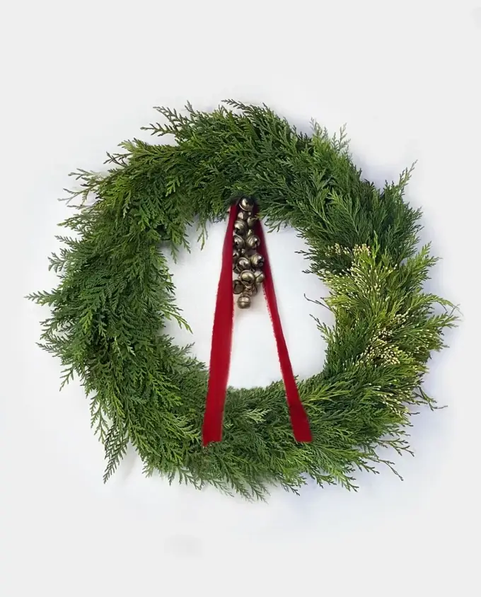 cedar-holiday-wreath-red-ribbon-sleigh-bells