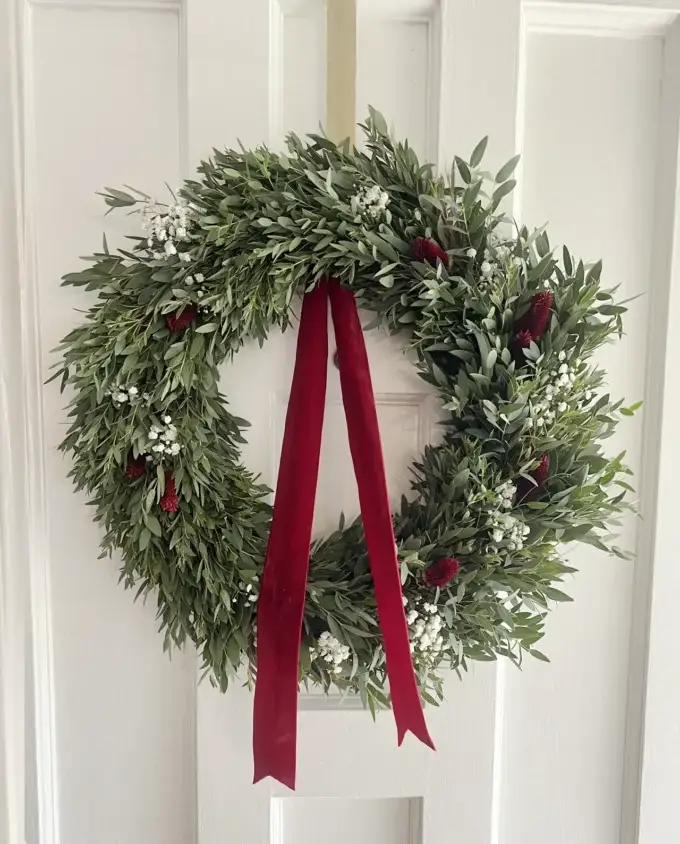 eucalyptus-gypsophilia-holiday-wreath-red-ribbon-door