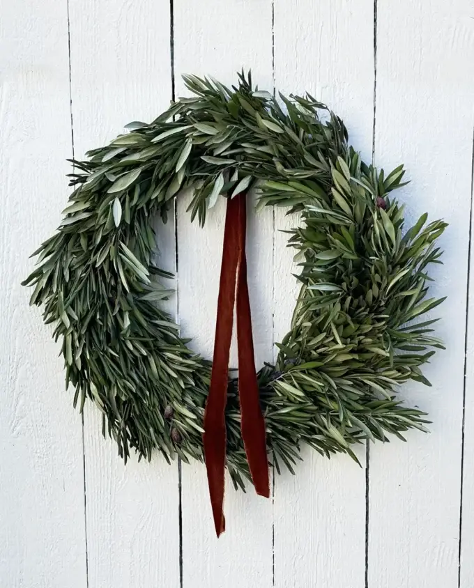 olive-branch-wreath-rust-ribbon-fence